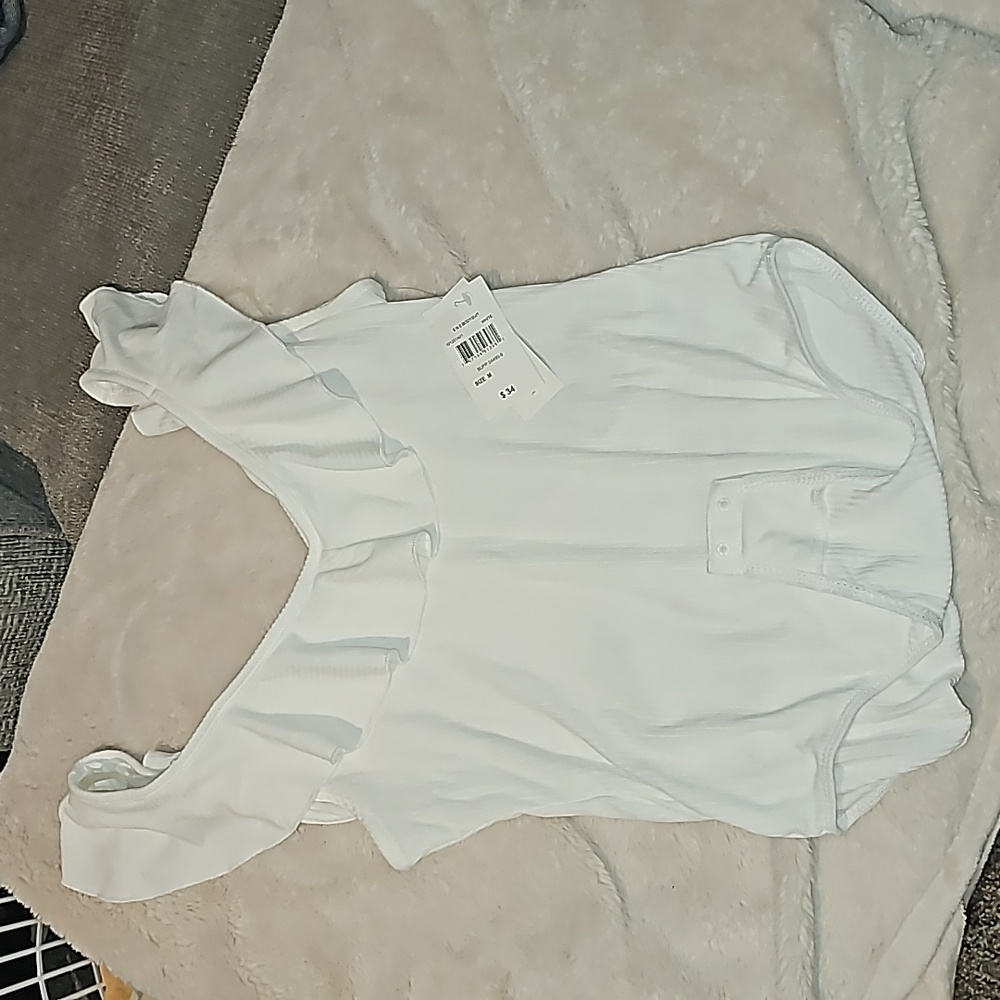 White bodysuit with ruffles